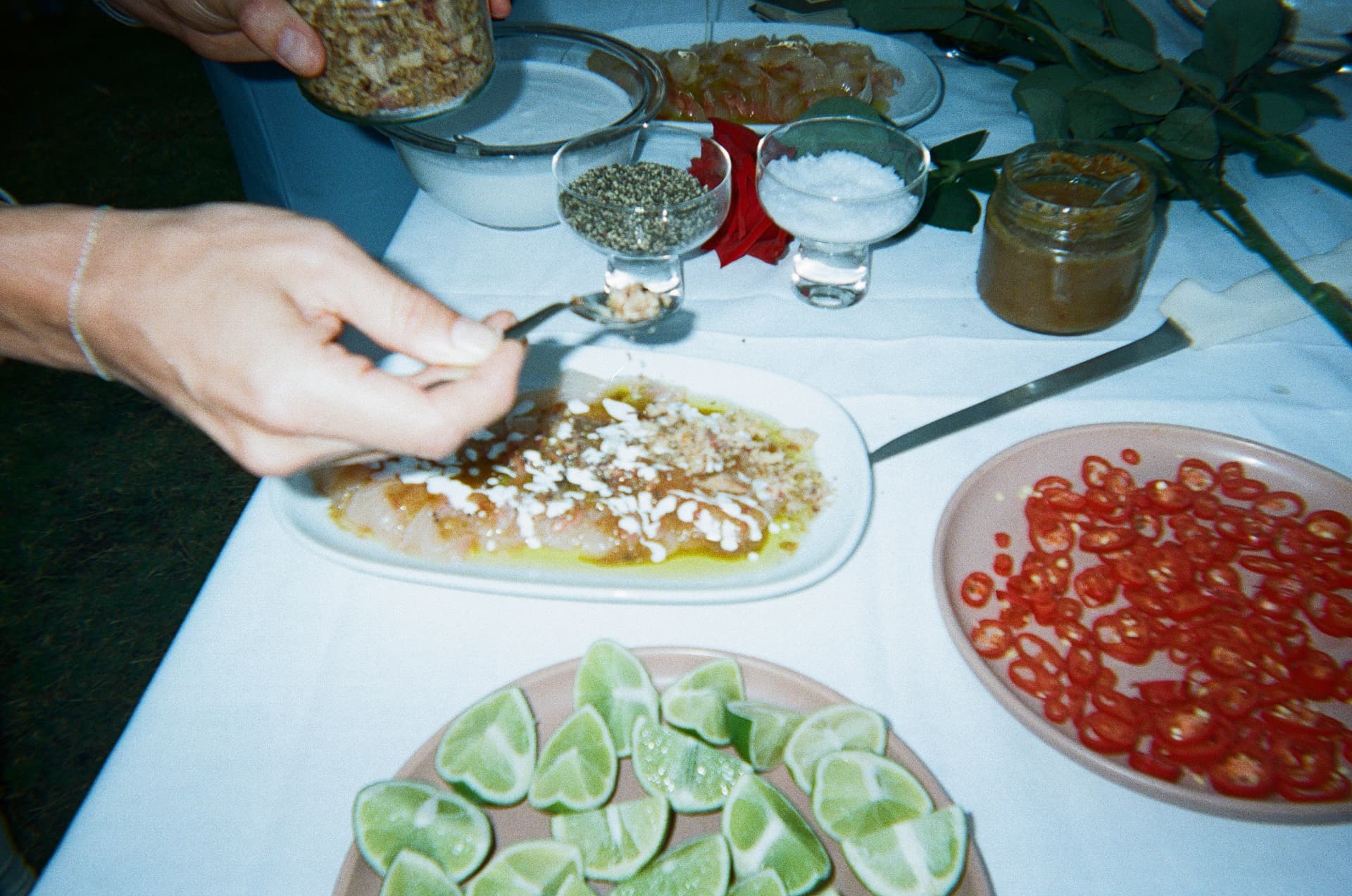 Crudo dressed to order — chilli, lime, salt