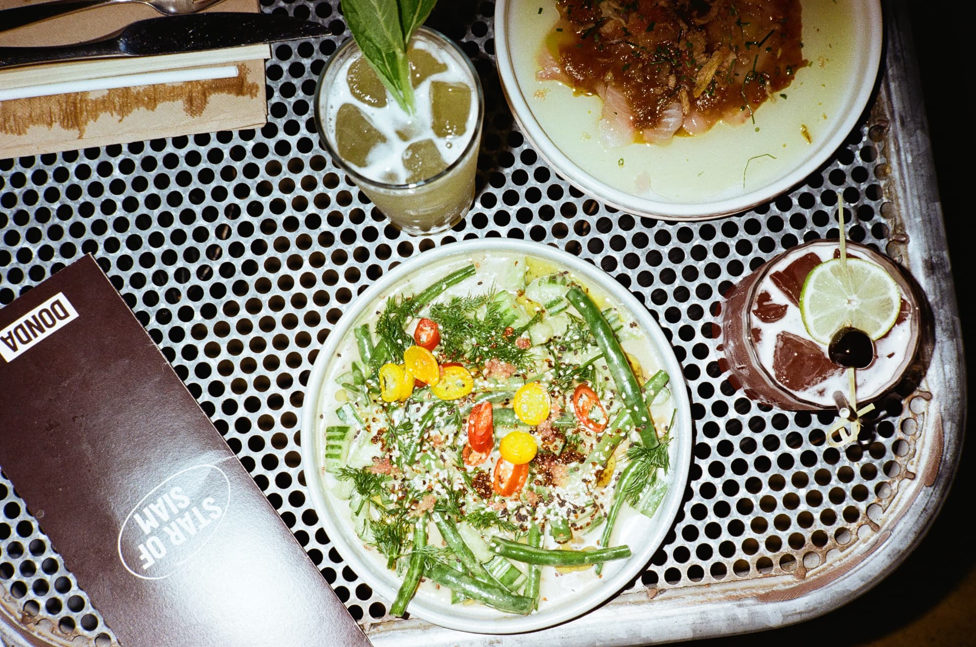 Dishes and drinks on a DONDA tray